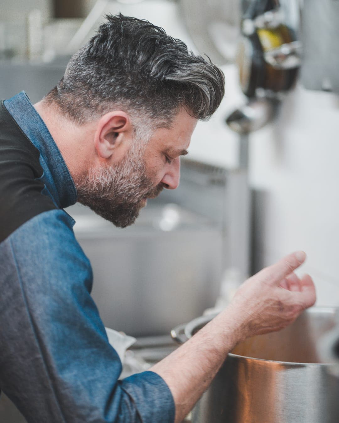 The chef at work over the pass.