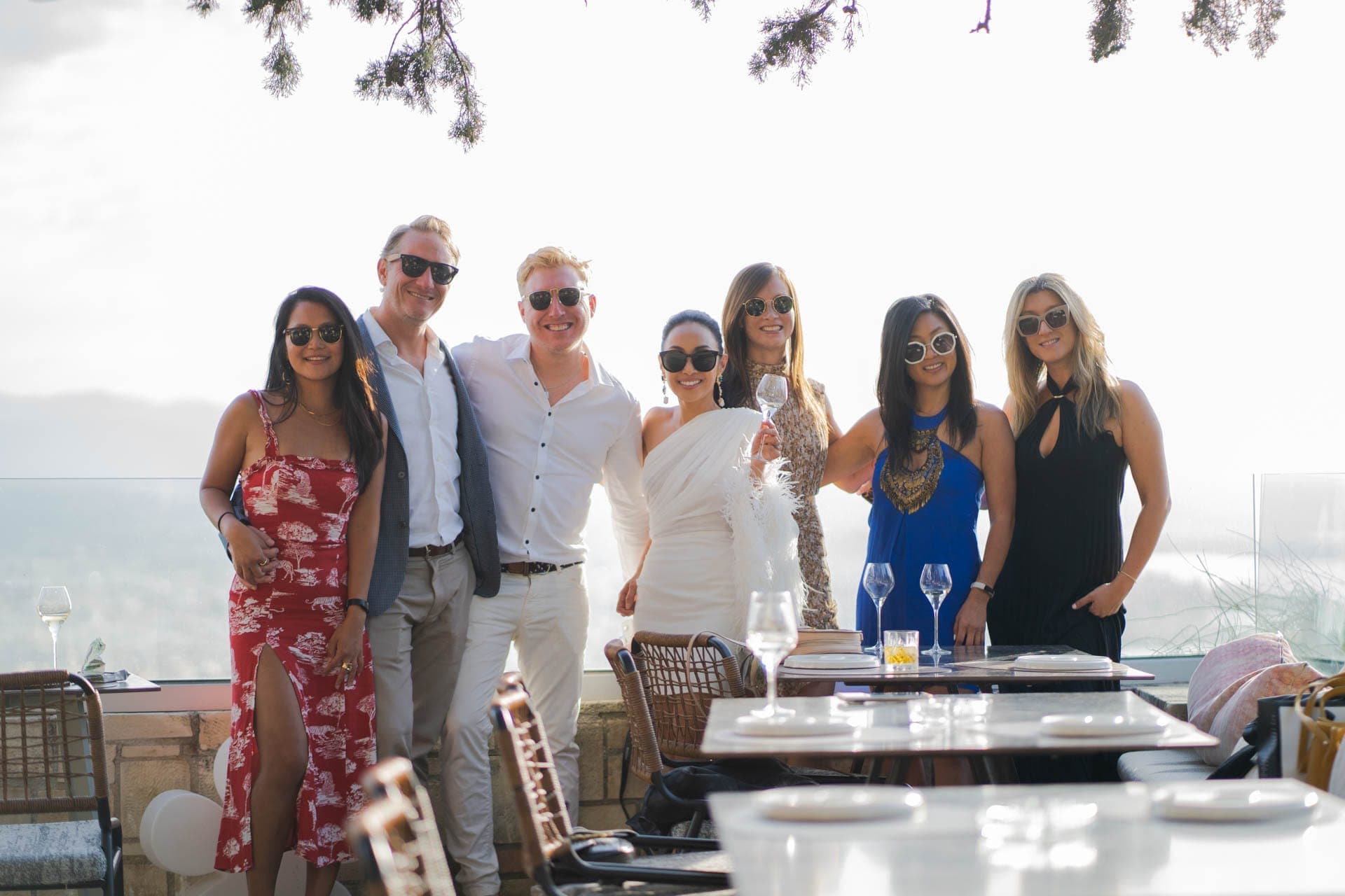Friends gathered on the terrace at golden hour.
